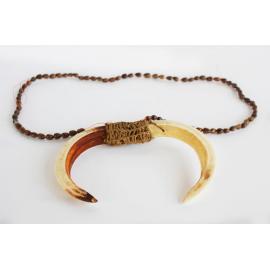 Boar tusk chest ornament, Paupa Region/Papua New Guinea
