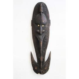 Black carved wooden ancestral hook mask